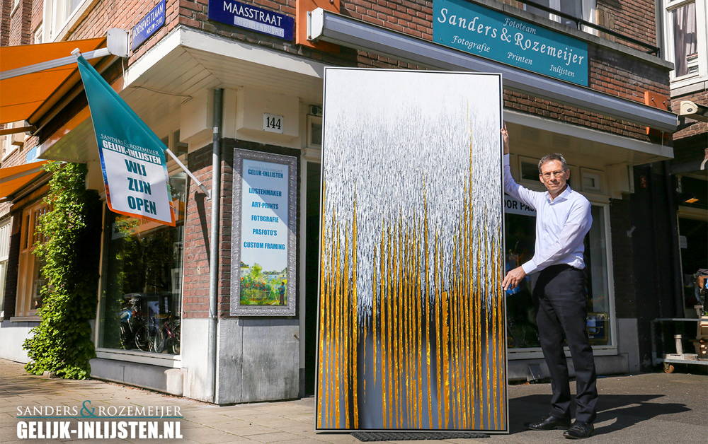 Canvas spannen en inlijsten in een baklijst